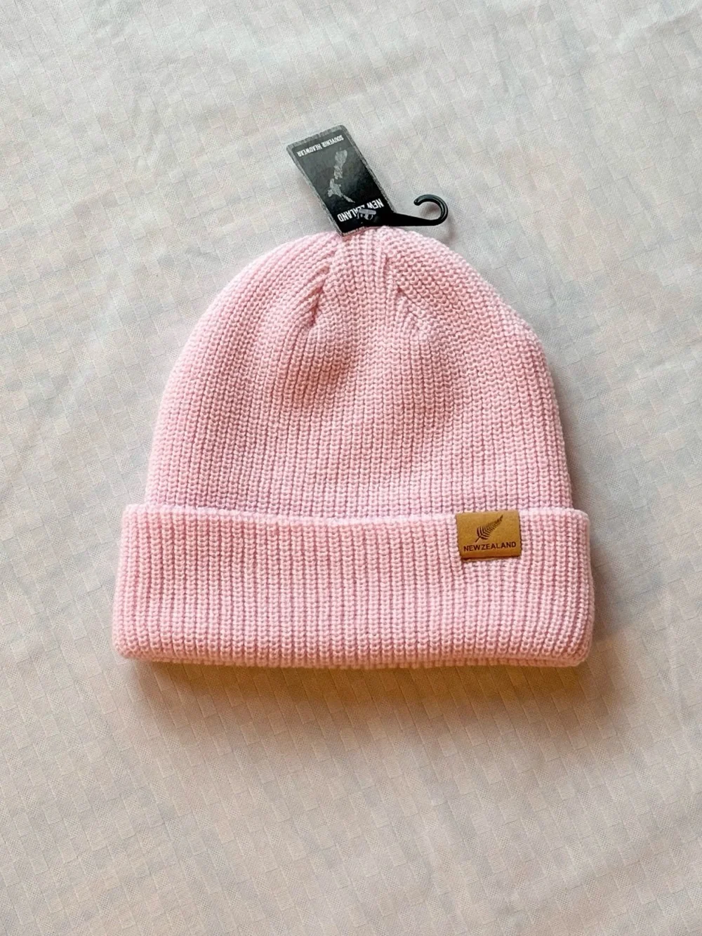 Baby pink knit beanie from New Zealand